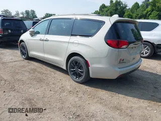 2020 Chrysler Pacifica Launch Edition with VIN 2C4RC3BGXLR267876, listed as a IAAI auction lot 42424841 with 87,586 mi miles and . Bid and sale history available at DreamBid. Image 3.