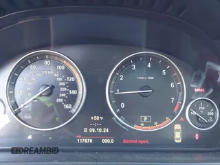 2013 BMW 5 Series 528i with VIN WBAXG5C56DDY31724, listed as a IAAI auction lot 41530179 with 117,876 mi miles and . Bid and sale history available at carsss.com. Image 7.