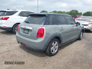 2015 MINI Hardtop 4 Door with VIN WMWXS5C56FT830418, listed as a IAAI auction lot 42132285 with 111,428 mi miles and . Bid and sale history available at DreamBid. Image 4.