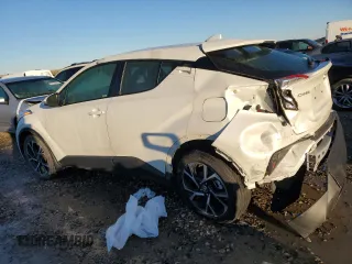 2020 Toyota C-HR LE z VIN JTNKHMBX1L1092779, wystawiony jako Copart lot #43259495 z przebiegiem 49 821 mil mil oraz Szkoda całkowita • Salvage title. Historia ofert i sprzedaży dostępna na DreamBid. Obrazek 2.