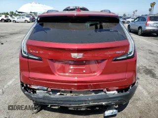 2019 Cadillac XT4 FWD Sport with VIN 1GYFZER4XKF167897, listed as a Copart auction lot 59224635 with 37,770 mi miles and Salvage title. Bid and sale history available at DreamBid. Image 6.