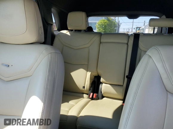 2019 Cadillac XT5 FWD with VIN 1GYKNARS1KZ121732, listed as a Copart auction lot 54882885 with 72,142 mi miles and Salvage title. Bid and sale history available at DreamBid. Image 10.