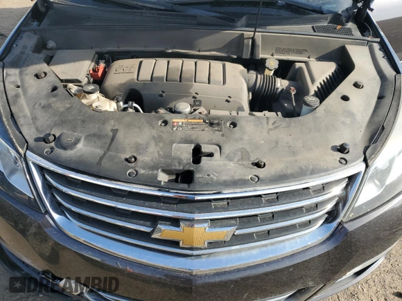 2014 Chevrolet Traverse LTZ z VIN 1GNKVJKD5EJ212952, wystawiony jako Copart lot #54815805 z przebiegiem 185 329 mil mil oraz Czysty tytuł • Clean title. Historia ofert i sprzedaży dostępna na DreamBid. Obrazek 12.