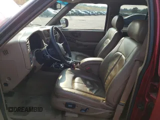 2000 Oldsmobile Bravada z VIN 1GHDT13W6Y2308007, wystawiony jako Copart lot #63862394 z przebiegiem 142 617 mil mil oraz Szkody całkowita. Historia ofert i sprzedaży dostępna na DreamBid. Obrazek 7.