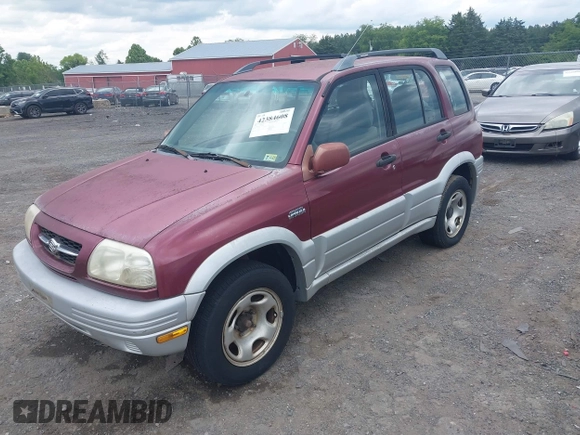 2000 Suzuki Grand Vitara JLX z VIN JS3TD62V7Y4119022, wystawiony jako IAAI lot #42384608 z przebiegiem 153 943 mil mil oraz . Historia ofert i sprzedaży dostępna na DreamBid. Obrazek 2.