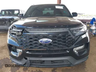2022 Ford Explorer ST-Line z VIN 1FMSK7KH5NGA21032, wystawiony jako IAAI lot #42212415 z przebiegiem 49 034 mil mil oraz . Historia ofert i sprzedaży dostępna na DreamBid. Obrazek 12.