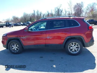 2015 Jeep Cherokee Latitude with VIN 1C4PJMCB6FW714656, listed as a IAAI auction lot 41887261 with 131,600 mi miles and . Bid and sale history available at carsss.com. Image 14.