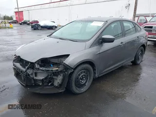 2012 Ford Focus SE with VIN 1FAHP3F24CL217777, listed as a IAAI auction lot 41831391 with 218,308 mi miles. Bid and sale history available at carsss.com. Image 2.