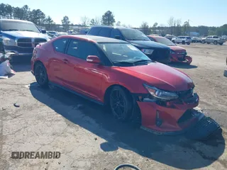 2016 Scion tC with VIN JTKJF5C78GJ025704, listed as a IAAI auction lot 41706518 with 29,460 mi miles. Bid and sale history available at carsss.com. Image 1.