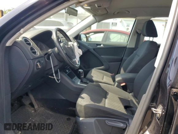 2013 Volkswagen Tiguan SE z VIN WVGBV3AX9DW603521, wystawiony jako Copart lot #59406465 z przebiegiem 133 647 mil mil oraz Szkoda całkowita • Salvage title. Historia ofert i sprzedaży dostępna na DreamBid. Obrazek 7.