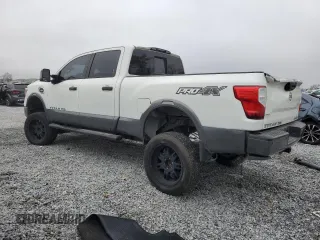 2017 Nissan Titan XD SL with VIN 1N6BA1F43HN544218, listed as a Copart auction lot 85758614 with 124,765 mi miles and Salvage Title. Bid and sale history available at carsss.com. Image 2.