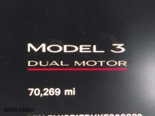 2019 Tesla Model 3 Long Range with VIN 5YJ3E1EBXKF393329, listed as a IAAI auction lot 41586996 with 70,269 mi miles. Bid and sale history available at carsss.com. Image 16.