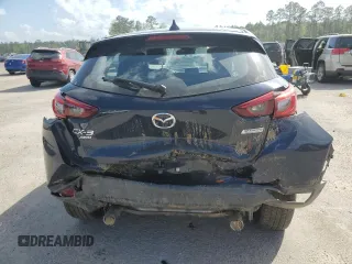 2018 Mazda CX-3 Grand Touring z VIN JM1DKFD79J0329416, wystawiony jako Copart lot #51708325 z przebiegiem 64 597 mil mil oraz Szkody całkowita. Historia ofert i sprzedaży dostępna na DreamBid. Obrazek 6.