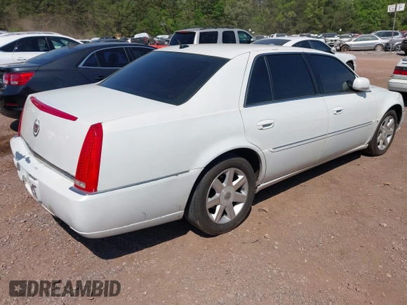 2006 Cadillac DTS w/1SC with VIN 1G6KD57Y36U116528, listed as a IAAI auction lot 42063595 with 128,839 mi miles. Bid and sale history available at carsss.com. Image 4.