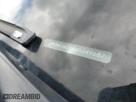 2018 Mazda CX-5 Touring z VIN JM3KFBCM4J0349687, wystawiony jako Copart lot #55857945 z przebiegiem Nie podano mil oraz Szkoda całkowita • Salvage title. Historia ofert i sprzedaży dostępna na DreamBid. Obrazek 13.