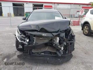 2018 Kia Optima LX z VIN 5XXGT4L33JG270472, wystawiony jako IAAI lot #42292416 z przebiegiem 60 064 mil mil oraz . Historia ofert i sprzedaży dostępna na DreamBid. Obrazek 13.