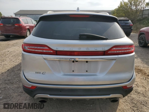 2019 Lincoln MKC Standard with VIN 5LMCJ1D93KUL07403, listed as a Copart auction lot 75293804 with 77,811 mi miles and Non Repairable. Bid and sale history available at DreamBid. Image 6.