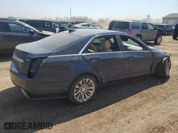 2019 Cadillac CTS Luxury AWD z VIN 1G6AX5SS1K0101825, wystawiony jako Copart lot #52970115 z przebiegiem 56 886 mil mil oraz Czysty tytuł • Clean title. Historia ofert i sprzedaży dostępna na DreamBid. Obrazek 3.