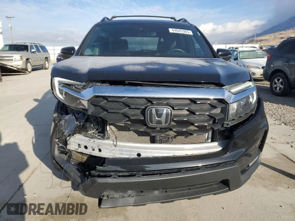 2023 Honda Passport EX-L with VIN 5FNYF8H58PB009525, listed as a Copart auction lot 44645365 with 30,582 mi miles and Salvage Title. Bid and sale history available at carsss.com. Image 5.