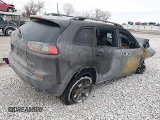2019 Jeep Cherokee Trailhawk Elite with VIN 1C4PJMBX9KD329661, listed as a IAAI auction lot 41704933 with 1 mi miles. Bid and sale history available at carsss.com. Image 4.