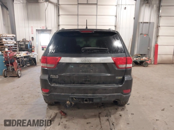 2011 Jeep Grand Cherokee 70th Anniversary with VIN 1J4RR4GG3BC745652, listed as a IAAI auction lot 41133698 with 217,948 mi miles. Bid and sale history available at carsss.com. Image 16.