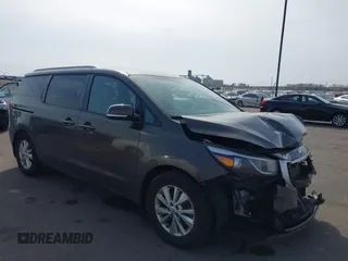 2017 Kia Sedona LX with VIN KNDMB5C19H6329933, listed as a IAAI auction lot 41796158 with 101,399 mi miles. Bid and sale history available at carsss.com. Image 1.
