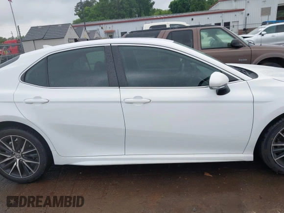 2023 Toyota Camry SE z VIN 4T1G11AK4PU738724, wystawiony jako IAAI lot #42123044 z przebiegiem 58 659 mil mil oraz . Historia ofert i sprzedaży dostępna na DreamBid. Obrazek 13.