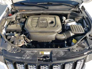 2017 Jeep Grand Cherokee Altitude with VIN 1C4RJEAG9HC702812, listed as a Copart auction lot 62423495 with 162,982 mi miles and Salvage title. Bid and sale history available at DreamBid. Image 12.