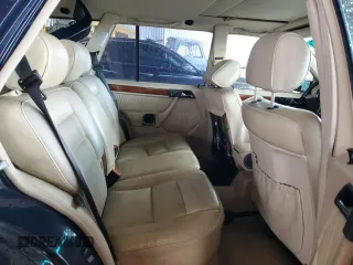 1995 Mercedes-Benz E with VIN WDBEA92E6SF318493, listed as a Copart auction lot 49295995 with 191,983 mi miles and Clean Title. Bid and sale history available at DreamBid. Image 10.