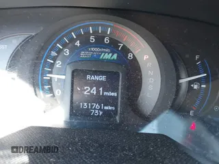 2012 Honda Insight LX with VIN JHMZE2H56CS004226, listed as a IAAI auction lot 41705401 with 131,761 mi miles and . Bid and sale history available at DreamBid. Image 7.