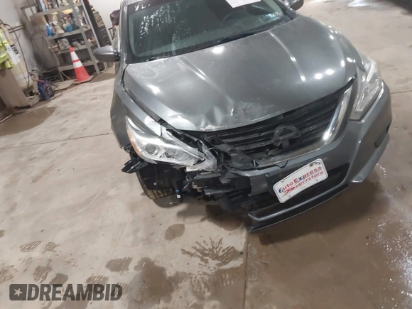2016 Nissan Altima SR with VIN 1N4AL3AP8GC213365, listed as a IAAI auction lot 41757090 with 141,065 mi miles and . Bid and sale history available at carsss.com. Image 6.