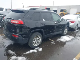 2017 Jeep Cherokee Sport with VIN 1C4PJMAB3HW599844, listed as a IAAI auction lot 41612508 with 112,237 mi miles. Bid and sale history available at carsss.com. Image 4.