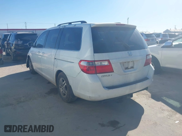 2006 Honda Odyssey EX with VIN 5FNRL38426B400952, listed as a IAAI auction lot 41346853 with 210,826 mi miles and . Bid and sale history available at DreamBid. Image 3.