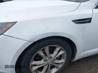 2013 Kia Optima LX z VIN 5XXGM4A70DG224007, wystawiony jako IAAI lot #41946901 z przebiegiem 208 055 mil mil oraz . Historia ofert i sprzedaży dostępna na DreamBid. Obrazek 6.