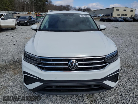 2023 Volkswagen Tiguan S with VIN 3VVRB7AX1PM054678, listed as a Copart auction lot 42378655 with 23,694 mi miles and Salvage title. Bid and sale history available at DreamBid. Image 5.