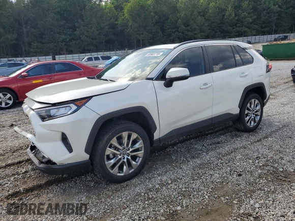 2021 Toyota RAV4 XLE Premium with VIN 2T3A1RFV6MW142184, listed as a Copart auction lot 60983715 with 31,814 mi miles and Salvage title. Bid and sale history available at DreamBid. Image 1.