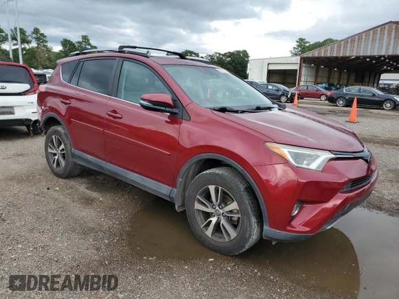 2018 Toyota RAV4 XLE with VIN 2T3WFREV7JW464160, listed as a Copart auction lot 63872925 with 70,826 mi miles and Salvage title. Bid and sale history available at DreamBid. Image 4.