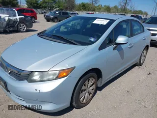 2012 Honda Civic Sdn LX with VIN 2HGFB2F53CH518723, listed as a IAAI auction lot 41995943 with 204,984 mi miles. Bid and sale history available at carsss.com. Image 2.