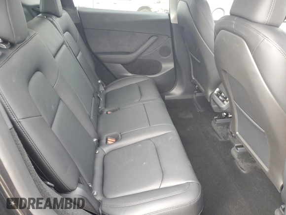 2025 Tesla Model Y Long Range with VIN 7SAYGDED6SF227475, listed as a Copart auction lot 42634345 with 3,493 mi miles and Salvage Title. Bid and sale history available at DreamBid. Image 11.