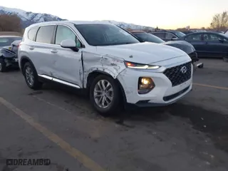 2019 Hyundai Santa Fe SE with VIN 5NMS23AD9KH077362, listed as a IAAI auction lot 41890584 with 132,476 mi miles. Bid and sale history available at carsss.com. Image 1.