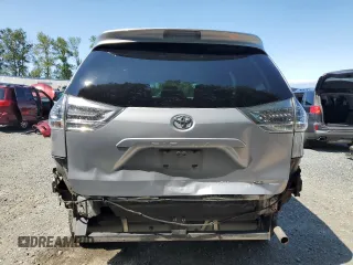 2014 Toyota Sienna SE z VIN 5TDXK3DC1ES457564, wystawiony jako Copart lot #59390205 z przebiegiem 131 090 mil mil oraz Szkoda całkowita • Salvage title. Historia ofert i sprzedaży dostępna na DreamBid. Obrazek 6.