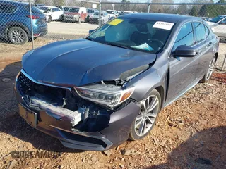 2020 Acura TLX w/Technology Pkg with VIN 19UUB3F49LA003406, listed as a IAAI auction lot 41352592 with 73,125 mi miles. Bid and sale history available at carsss.com. Image 2.