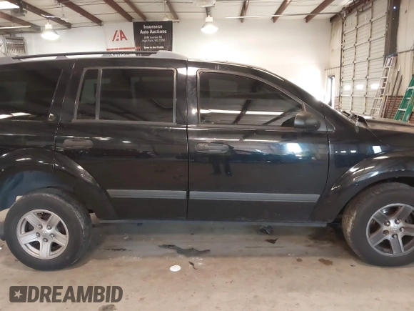 2006 Dodge Durango SXT with VIN 1D4HD38K16F129744, listed as a IAAI auction lot 41006004 with 237,951 mi miles and . Bid and sale history available at DreamBid. Image 13.