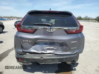 2021 Honda CR-V Touring z VIN 5J6RW2H94ML019220, wystawiony jako Copart lot #51437405 z przebiegiem 35 362 mil mil oraz Czysty tytuł • Clean title. Historia ofert i sprzedaży dostępna na DreamBid. Obrazek 6.