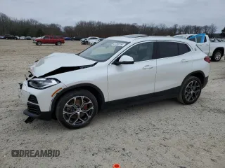 2023 BMW X2 sDrive28i with VIN WBXYH9C07P5V63719, listed as a Copart auction lot 87309194 with 43,124 mi miles and Salvage Title. Bid and sale history available at carsss.com. Image 1.