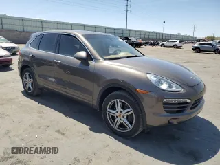 2014 Porsche Cayenne z VIN WP1AA2A28ELA91097, wystawiony jako Copart lot #57812585 z przebiegiem 115 596 mil mil oraz Szkoda całkowita • Salvage title. Historia ofert i sprzedaży dostępna na DreamBid. Obrazek 4.