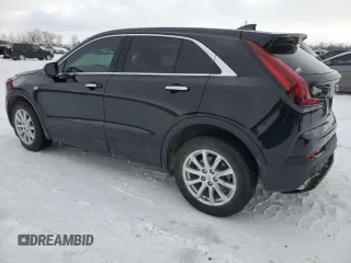 2022 Cadillac XT4 FWD Luxury z VIN 1GYAZAR48NF163967, wystawiony jako Copart lot #43148925 z przebiegiem 58 788 mil mil oraz Czysty tytuł • Clean title. Historia ofert i sprzedaży dostępna na DreamBid. Obrazek 2.