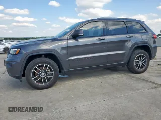 2018 Jeep Grand Cherokee Trailhawk with VIN 1C4RJFLG7JC467934, listed as a Copart auction lot 56193335 with 57,578 mi miles and Salvage title. Bid and sale history available at DreamBid. Image 1.