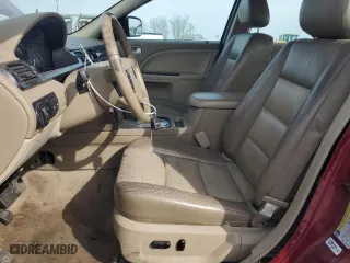 2005 Mercury Montego Premier with VIN 1MEFM42115G603371, listed as a Copart auction lot 48586595 with 142,098 mi miles and Salvage Title. Bid and sale history available at carsss.com. Image 7.
