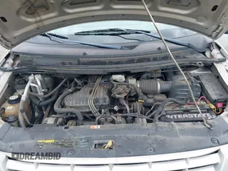 2004 Ford Freestar SE z VIN 2FMZA51664BA73569, wystawiony jako IAAI lot #39712844 z przebiegiem 182 013 mil mil oraz . Historia ofert i sprzedaży dostępna na DreamBid. Obrazek 10.